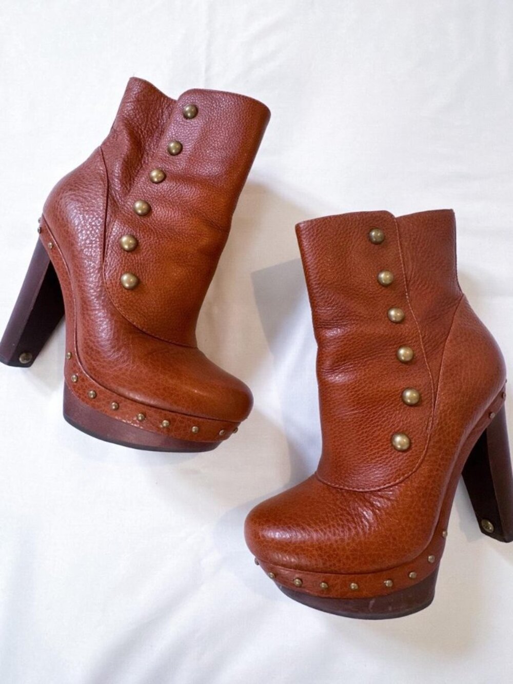 NWOT Ugg brown leather platform heeled booties with gold studded details